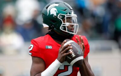 Michigan State QB says 'take the over,' and many bettors do