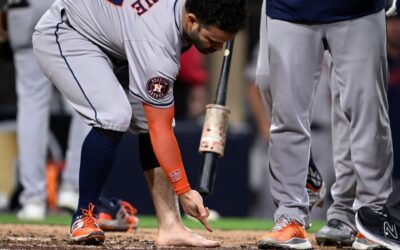 Jose Altuve tossed for removing cleat, sock in wild Astros win