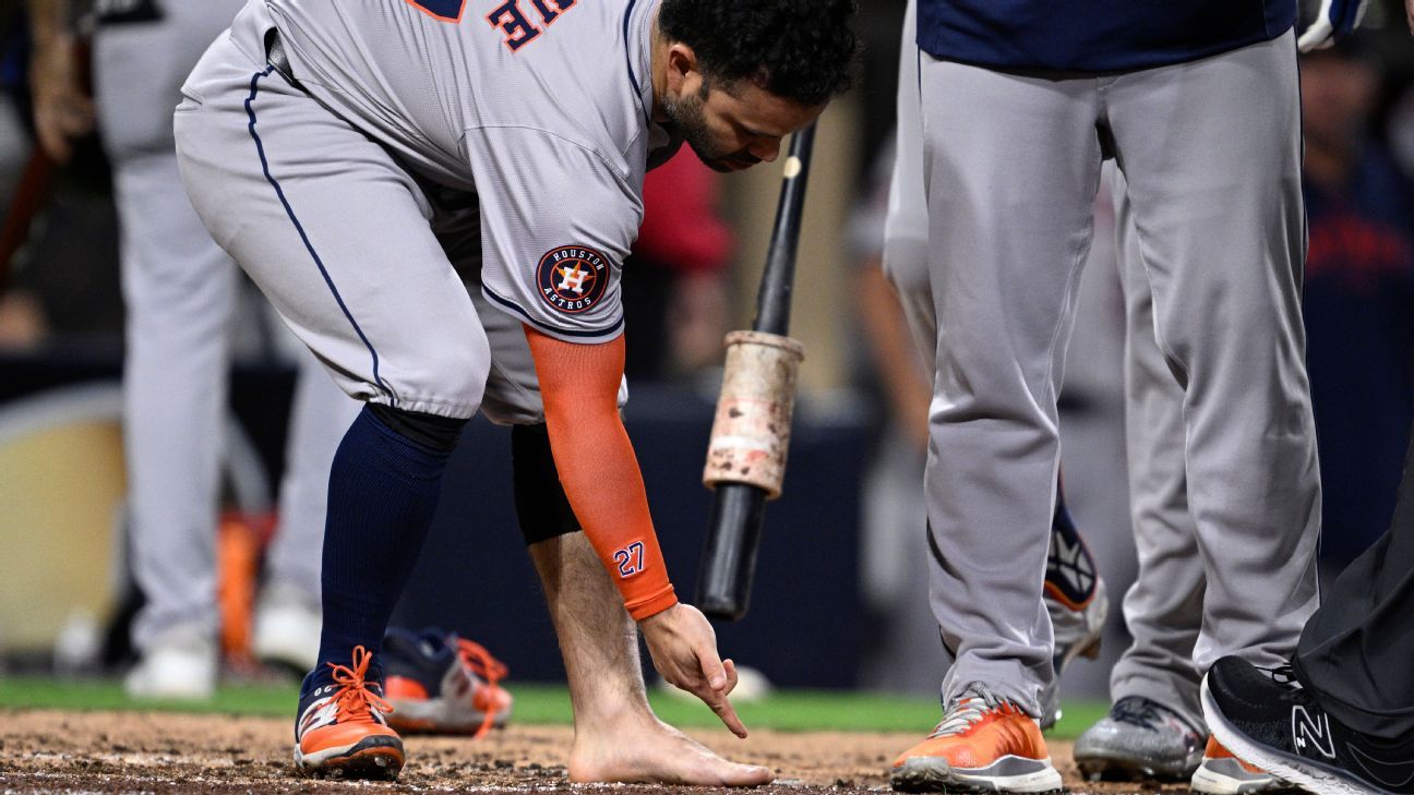 Jose Altuve tossed for removing cleat, sock in wild Astros win