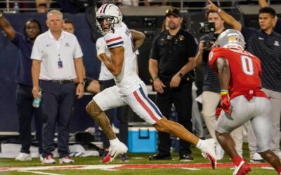 Arizona's Tetairoa McMillan has 304 yards, 4 TDs in blowout win