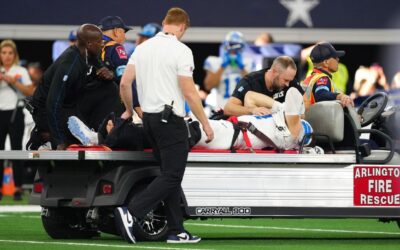 Lions' Aidan Hutchinson carted off with apparent serious leg injury