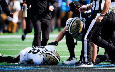 Saints' Chris Olave put on backboard, carted off with concussion