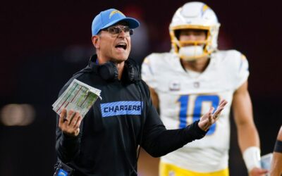 Chargers, Harbaugh frustrated by lack of calls for Herbert