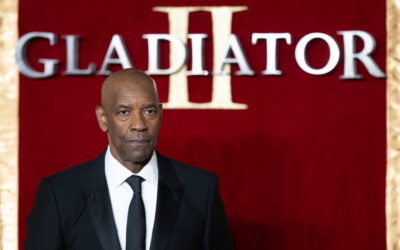 Denzel Washington Clarifies Gladiator II “Gay Kiss” After Director Ridley Scott Claims It Didn’t Happen