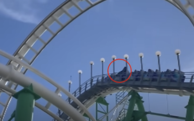 Man Escapes Roller Coaster After Safety Bar Malfunction