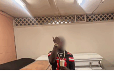 Texas Funeral Home Employee Fired After Posting Gun Photo With Casket to Gain Social Media Clout